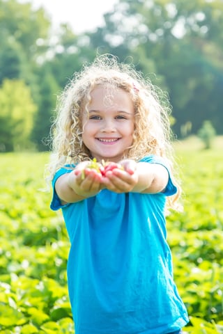 Girl with strawberries